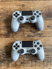 Pair of Sony PlayStation DualShock 4 - 20th Anniversary Edition (PS4)