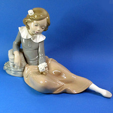 Nao Figurine by Lladró - Pondering Girl Reclining with Flowers - 1990 Retired