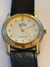 RJM - Round black and gold gents dress watch - Untested