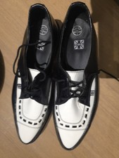 T.U.K. Black & White Leather
