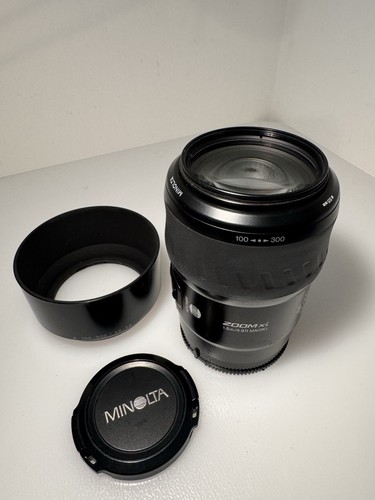 Minolta 100 300mm zoom xi - 100-300mm,