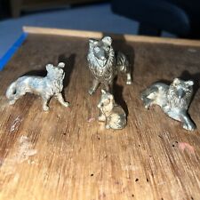 4 metallic (poss unmarked silver)  German Shepherds