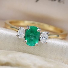 Emerald and 0.20ct Diamond Cluster Ring in 18ct Yellow Gold