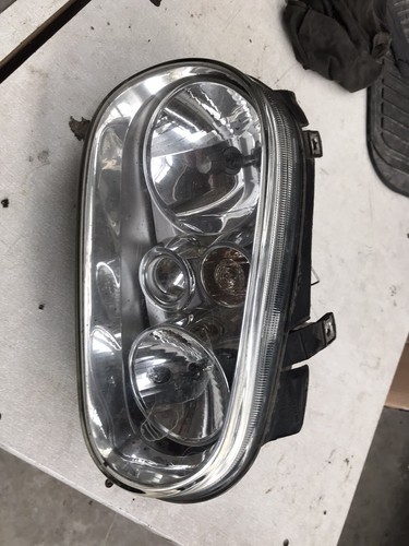 Golf mark headlight - 4, o/s