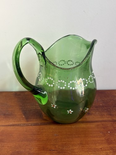 Green glass antique jug with - glass,