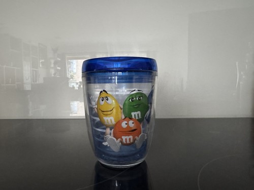 Used plastic cup - used, m&m
