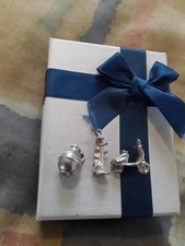 SILVER CHARM POT, MAN ON LAMP