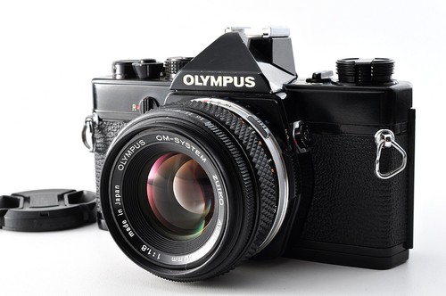 Near mint olympus 1 black - [near, om-1