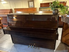 Stunning High Gloss Osztreicher Piano. Dark Mahogany Finish.