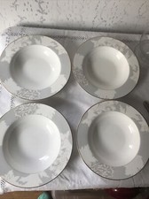 4 soup plates by Victoria & Albert museum. william morris