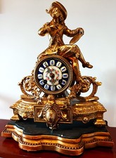 ANTIQUE FRENCH ORMOLU FIGURAL MANTEL CLOCK & STAND.