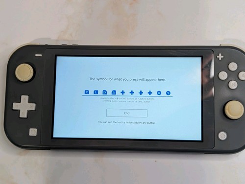 Nintendo switch lite grey - nintendo,