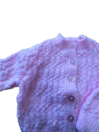 Hand knitted pink toddler - hand,