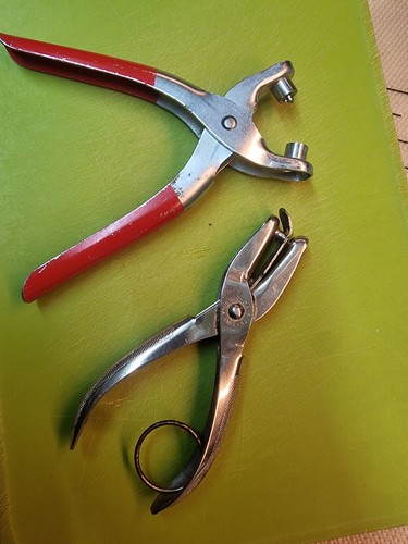 Hand held metal hole - hand,