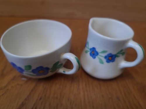 Small sized cup - and, hand