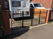 Bi-fold driveway wrought iron