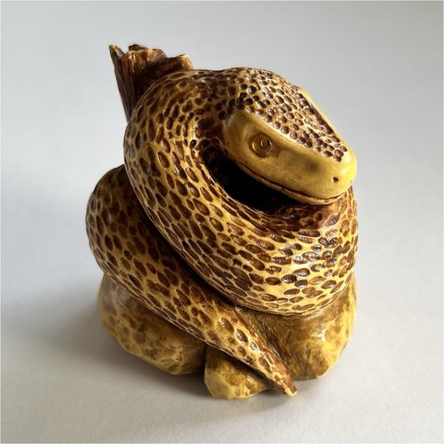 Handcrafted netsuke snake on - netsuke,