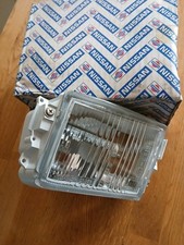 Nissan Sunny N14 GTI ,Front RH Fog Lamp Lens &Body New In Pack Genuine Part.