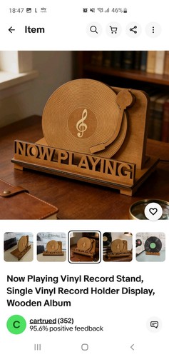 Now playing vinyl record stand - playing,