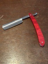 VINTAGE GOLD DOLLAR STRAIGHT EGDE RAZOR BEAUTIFUL RED HANDLE.