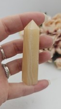 Orange calcite crystal - , point