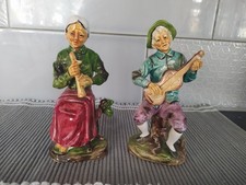 OLD MAN & WOMAN PLAYING
