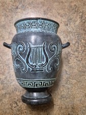 Replica of ancient Greek 2 handled urn or vase in bas-relief. Charcoal green.