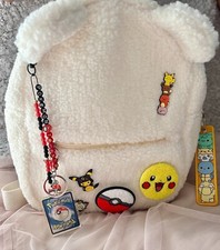 BRAND NEW Pokemon Trainer Pikachu card Eevee Charmander badge pin cute Backpack