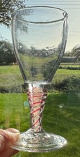 Red & white opaque-white twist stem wine glass, c1750.