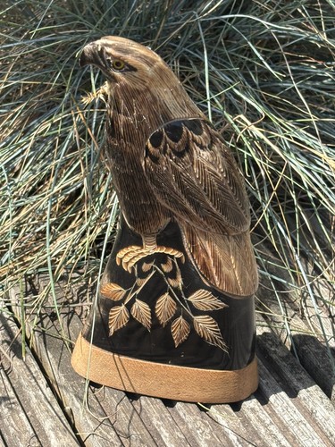 Striking bird prey - striking, carved