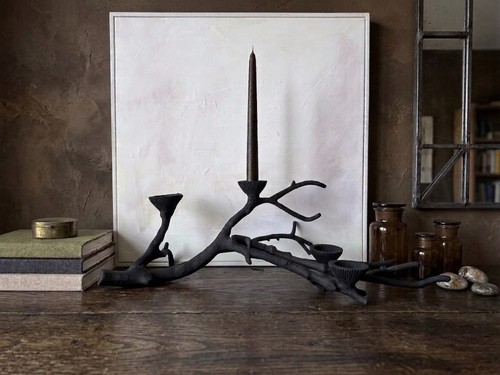 Eclectic cast iron candle