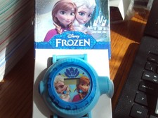 FROZEN WATCH  by AVON in box  UNUSED needs new battery   DIGITAL WITH PROJECTOR 