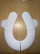 Frida Baby Fold-and-Go Toilet Seat | Folding Travel Toilet Seat Unisex with bag