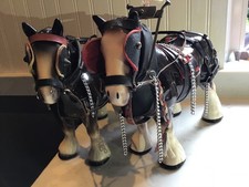 Pair of Large Ceramic Shire Horses with Harness.