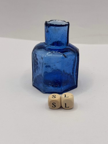 Old blue glass ink bottle