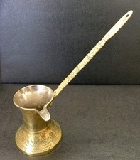 AN ANTIQUE BRASS TURKISH CEZVE