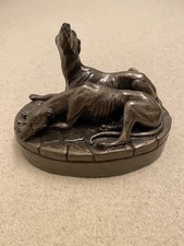 Pair of Greyhound Dogs Laying