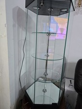 Revolving glass display case