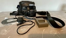 olympus omd e.m5 2 digital camera with 14-42mm zoom lens and flash