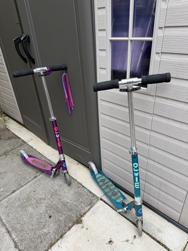 Two foldablemicro scooters - two,