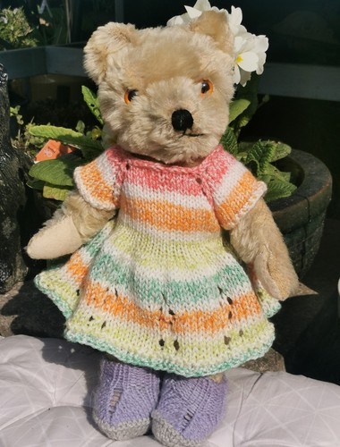 Hand knitted teddy bear
