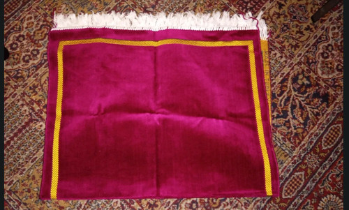 Pink prayer mat with yellow