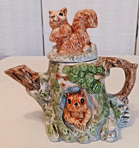 Novelty red squirrels - red, in