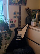 Epiphone - Explorer - Ebony,  HH, No Tremolo, Laurel Fingerboard      