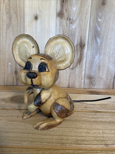 Hand carved wooden mouse - hand,