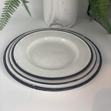 A Set Of Three White Vintage Collectible  Metal Enamel Plates With Black Edging