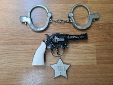 Vintage cap gun and lone - and, star