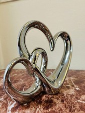 Double Chrome Heart Sculpture
