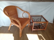 Vintage Bamboo Chair and double top glass table on coasters.