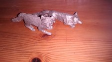 2 small Solid Pewter Fox Figures - 1 marked honeywell usa